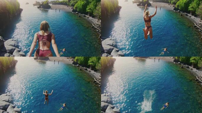 年轻女子跳入原始蓝色水中的POV镜头