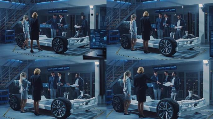 国际汽车设计工程师团队向一群投资者和商人介绍了未来的自主电动汽车平台底盘。带车轮、发动机和电池的车架