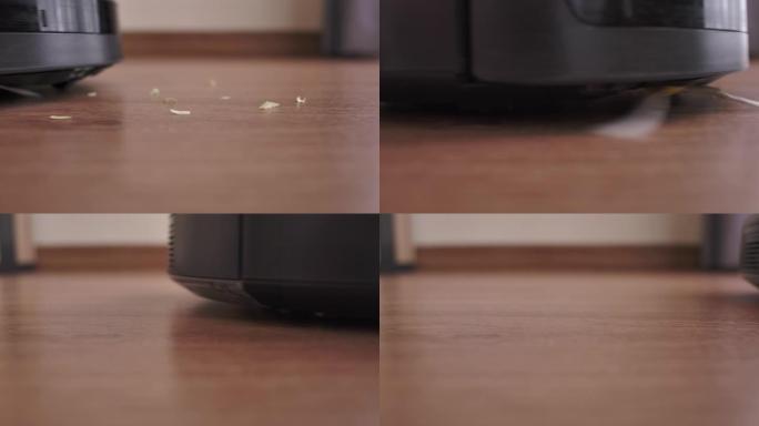 地板上的特写机器人吸尘器清洁