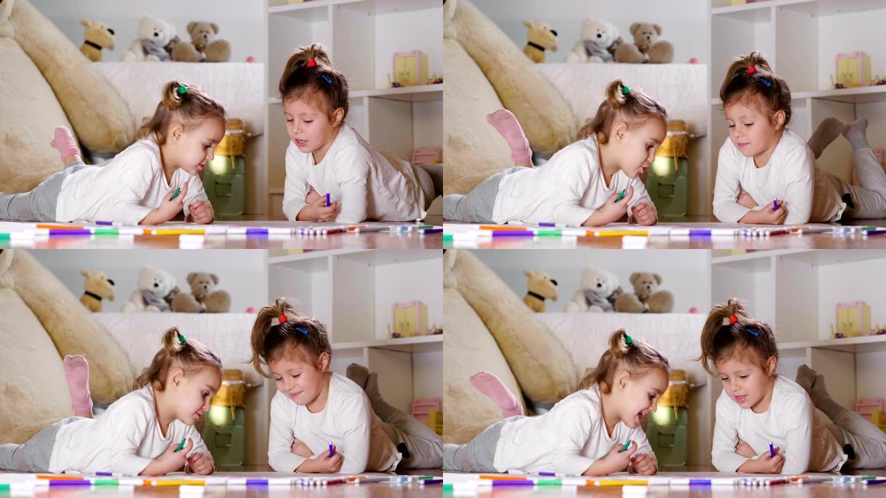 两个小女孩的肖像躺在他们卧室的地板上，用毡尖笔着色，并制作艺术画。