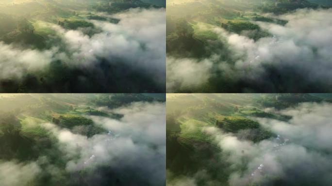 俯瞰云层的山顶村庄的鸟瞰图，4K DCI