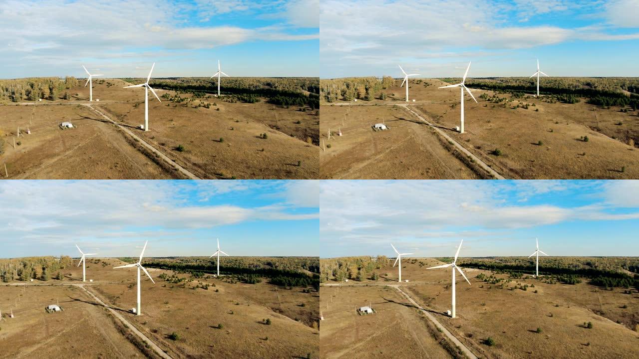 风力发电机在野外旋转。风力发电机，风力涡轮机从上面。