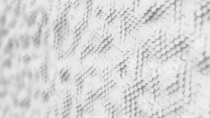抽象白色简约背景由浅景深的塑料六边形制成。轻最小六边形网格图案动画在现代干净的白色。无缝循环3d渲染