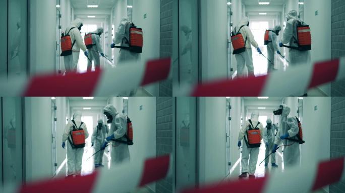 在新型冠状病毒肺炎大流行期间，一组消毒器正在对走廊进行消毒。消毒，卫生概念。