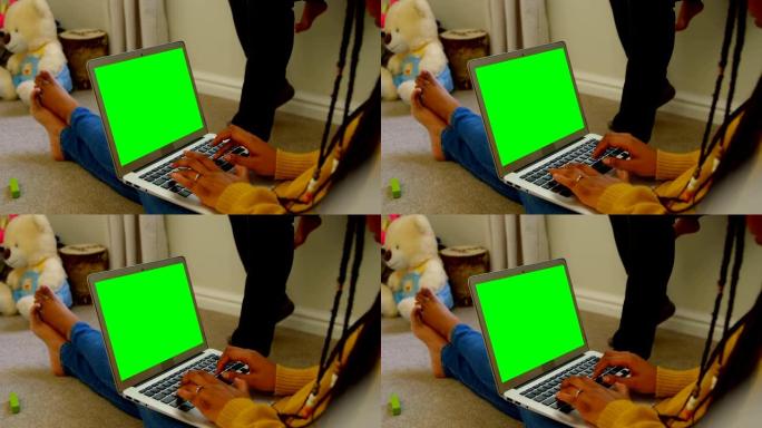 年轻黑人妇女使用笔记本电脑坐在舒适家庭4k地板上的侧视图