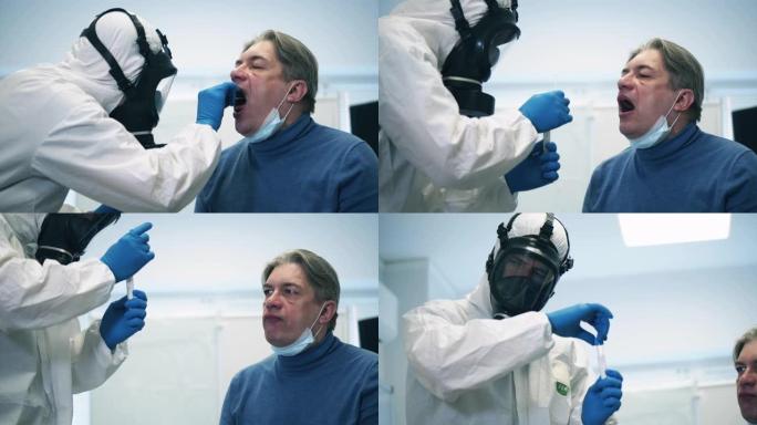 护理人员正在拿病人的唾液进行检测。感染，新型冠状病毒肺炎大流行，2019-ncov概念。
