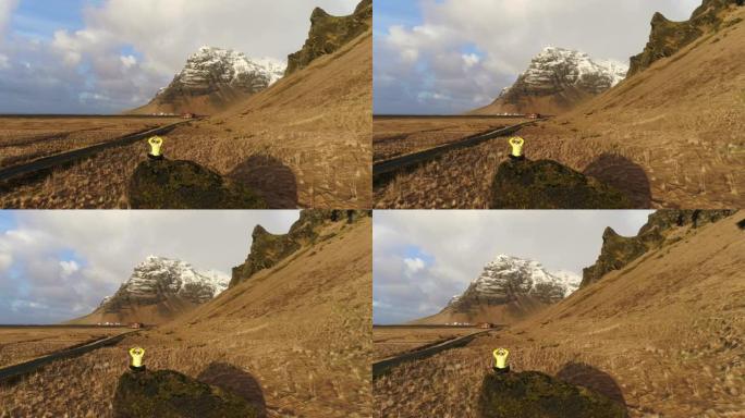 女士在冰岛阳光明媚的偏远山区景观中冥想岩石