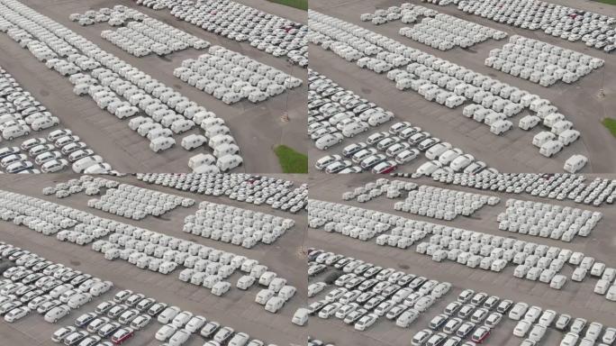 无人机: 在为从港口进入的全新汽车预留的停车场上方飞行。