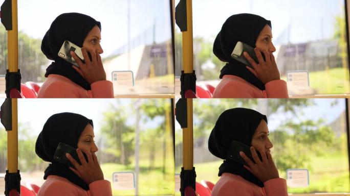 戴着头巾的年轻女子在公共汽车上通勤