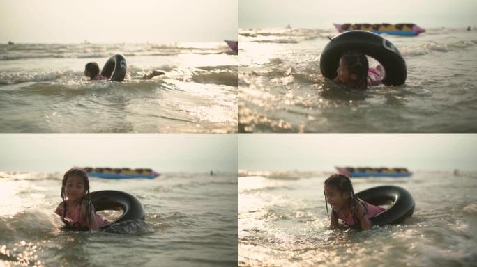女孩在浅海水中玩得开心