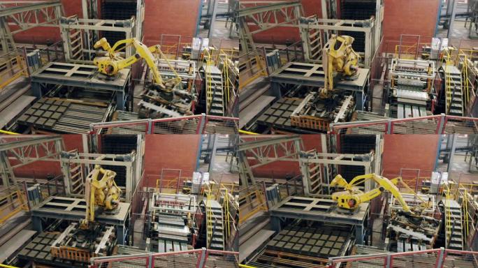 工业机械臂与砖块一起工作，将它们放在输送机上。