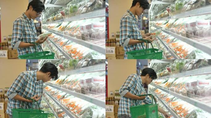 男子在超市购物新鲜蔬菜