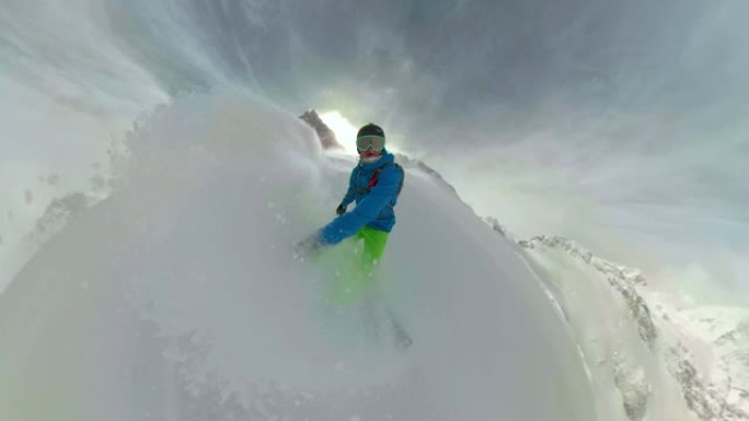 360VR: 极端的滑雪者在他从滑雪道上骑行时向他周围喷洒粉末雪