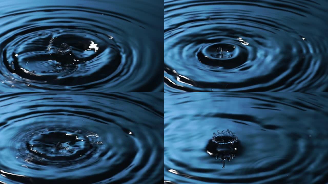 慢动作: 许多水滴变成蓝色的水。
