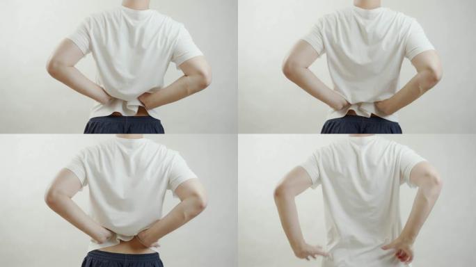 穿着白衬衫的亚洲男子感到腰痛。肌肉疼痛，保健概念。
