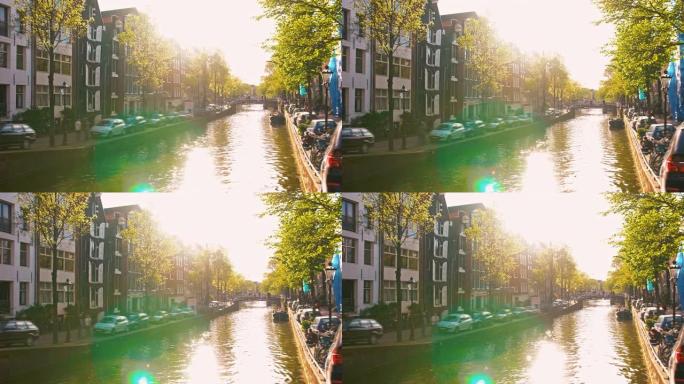 美丽晴天的阿姆斯特丹运河和田园诗般的城市景观