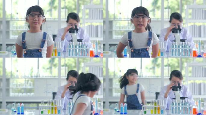 教育，学校，一个亚洲学生女孩的肖像站在教室里谈论科学。教育主题
