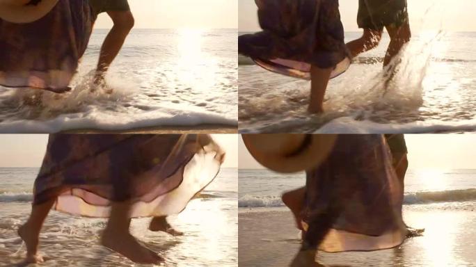快乐的情侣跑步。海边奔跑美女背影海滩沙滩