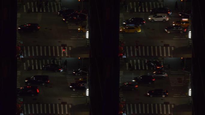 特写: 人们晚上沿着纽约熙熙攘攘的柏油路行走。
