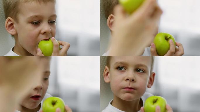 小男孩吃青苹果儿童小男孩吃苹果