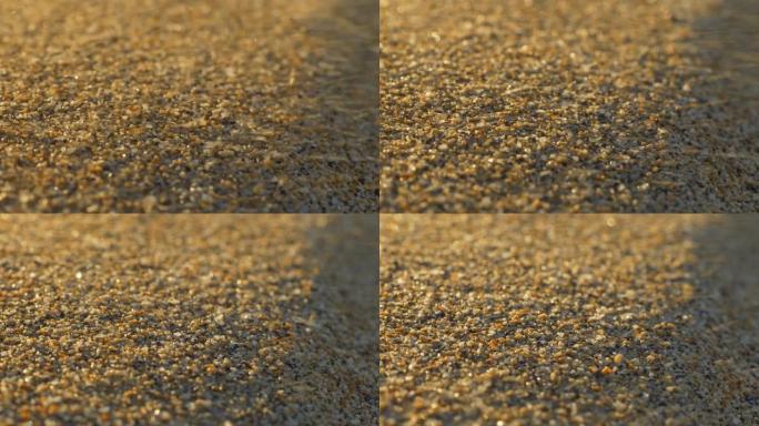 被风吹走的沙粒的宏观拍摄。慢动作镜头