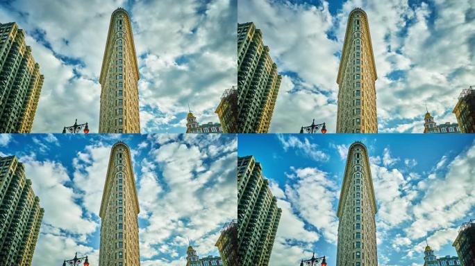 著名的广场熨斗大楼。晴天，蓝天云彩。住宅和金融建筑。旅游和商业。美国纽约