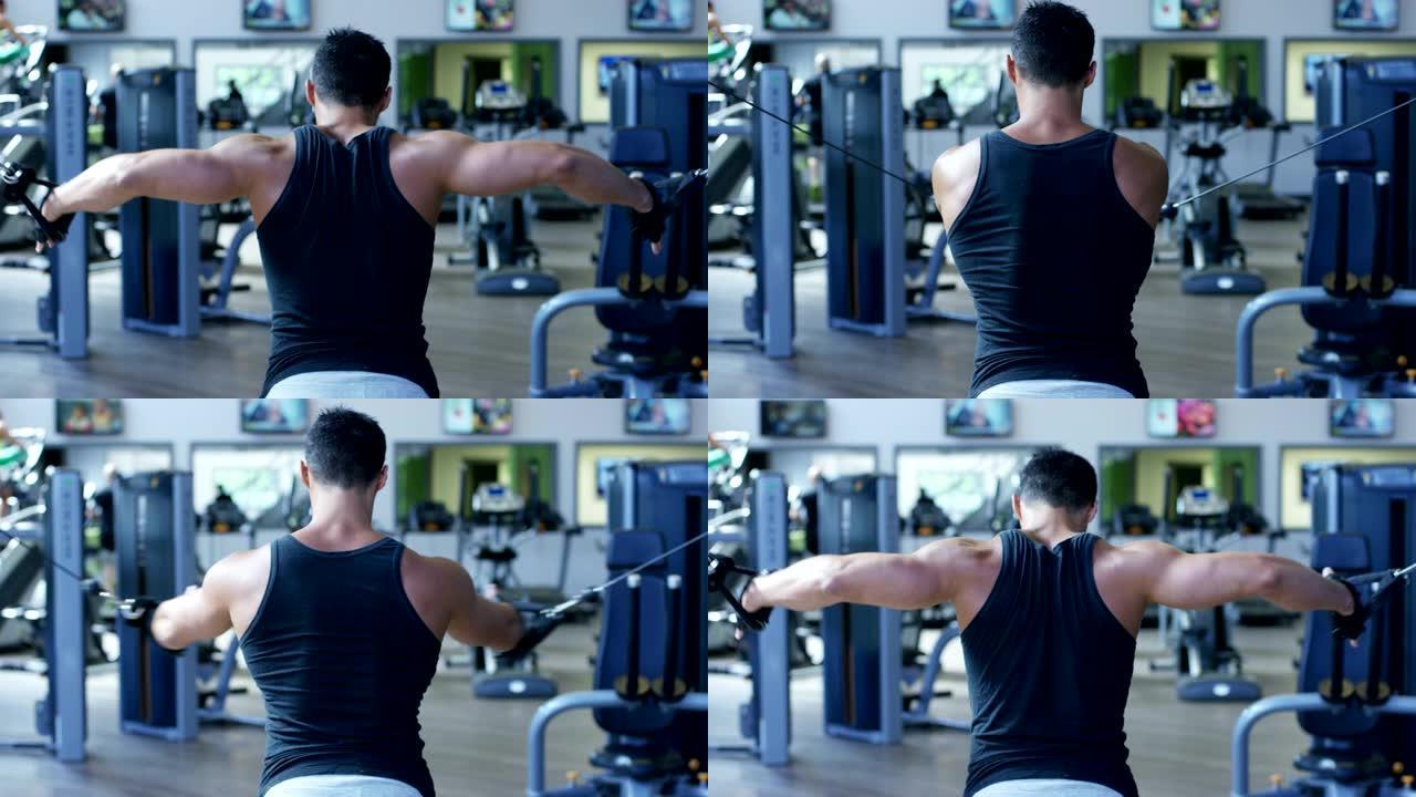 健身房里的健美运动员，用杠铃，卧推，改善三头肌，大胸肌，前三角肌。