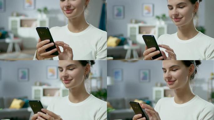美丽的年轻女子的肖像使用智能手机，在互联网上浏览，坐在家里检查社交网络。