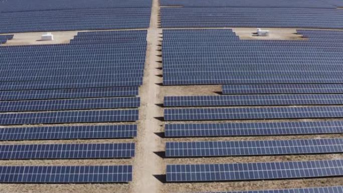 生产可再生能源的大型太阳能电池板农场的4k广角鸟瞰图
