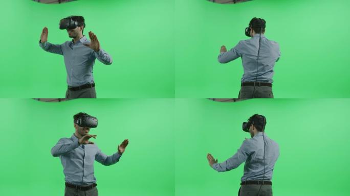 绿屏色键工作室: 使用虚拟现实耳机进行游戏的人，使用手势进行视频游戏或在3D软件中操纵交互环境。36