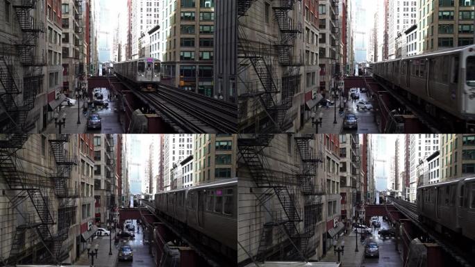 芝加哥环路地铁列车到达伊利诺伊州芝加哥市中心建筑物之间的火车站。城市公共交通，美国地标，或美国中西部