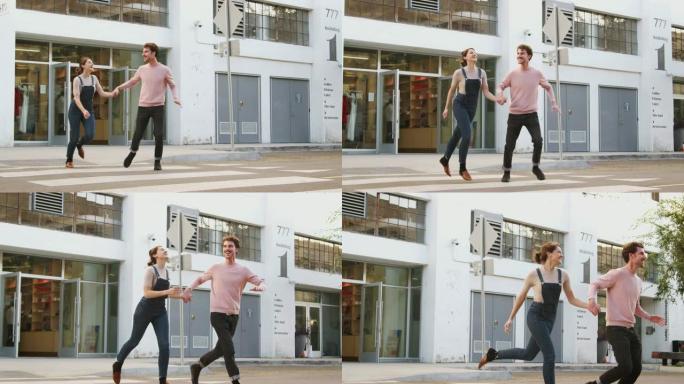 千禧一代潮人夫妇牵着手在城市的马路上奔跑，全长