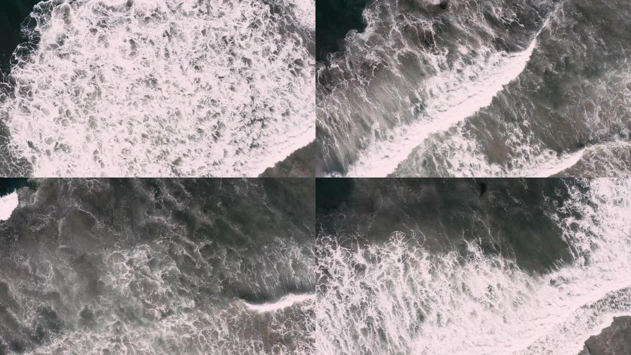 海浪撞击和起泡的俯视图