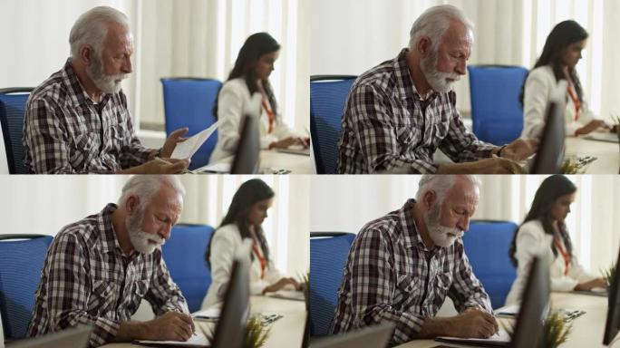 在办公室工作的商人