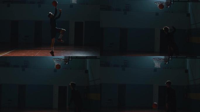 电影慢动作特写垂直镜头的年轻职业男球员正在健身房练习篮球锻炼