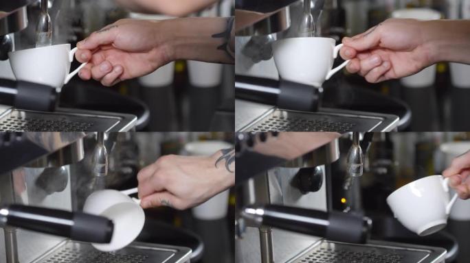 带热水的纹身咖啡师烫伤咖啡杯