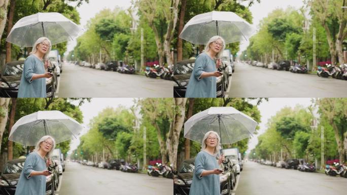 资深女子在城市下雨天等待出租车