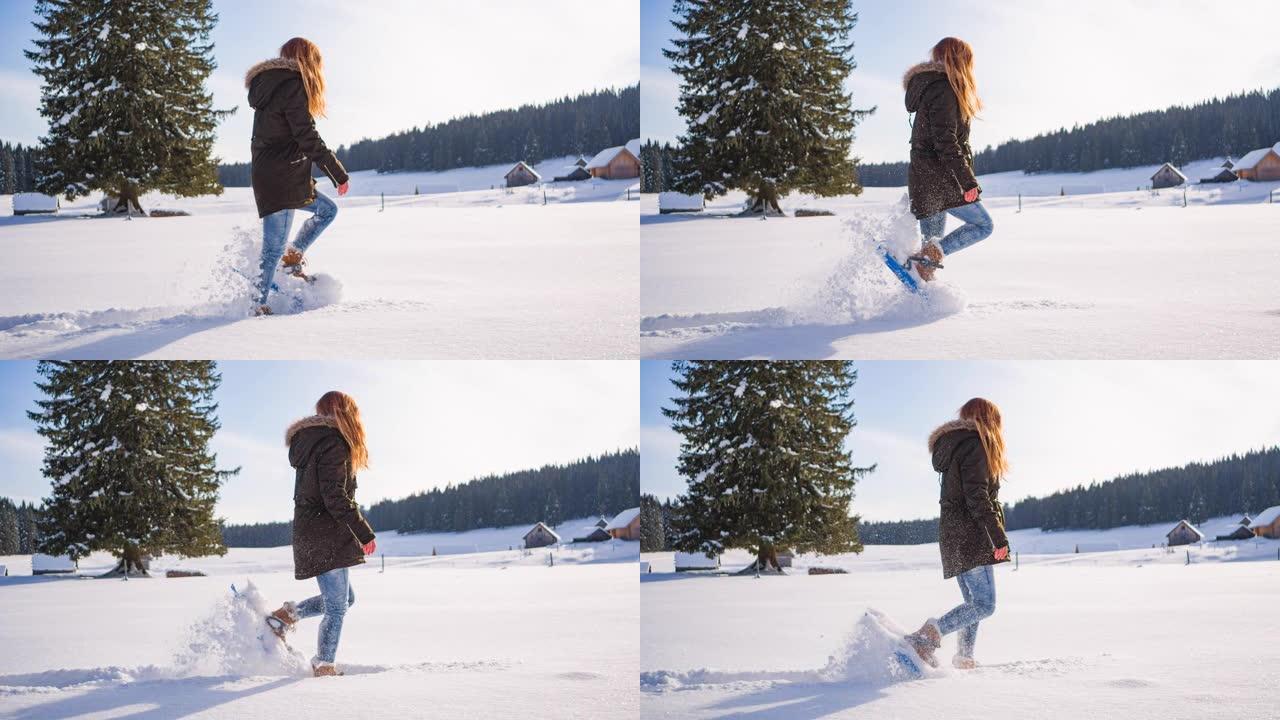 在美丽的晴天，雪鞋穿越神奇的冬季自然