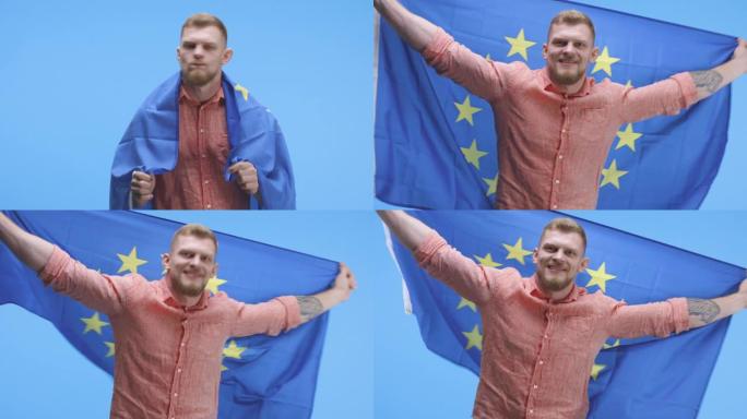 一个年轻人举着欧盟旗帜跳舞