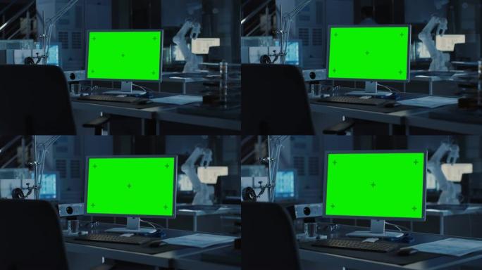 在台式计算机上，带有隔离的绿色模拟屏幕显示。背景机器人手臂概念站在沉重的黑暗中。工业工程设施，工程师