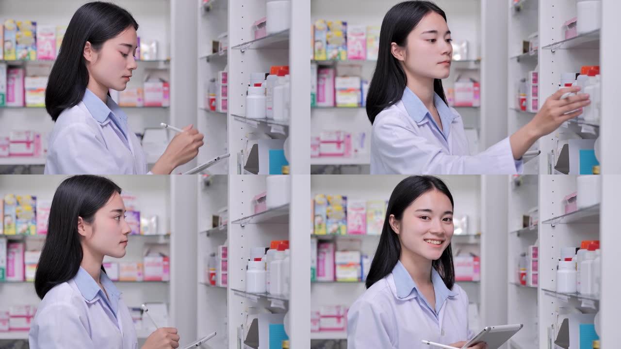 年轻女性药剂师拿着药片，用于在药房药店的盒子上检查药物详细信息。专业，医学，医疗保健，医学教育，制药