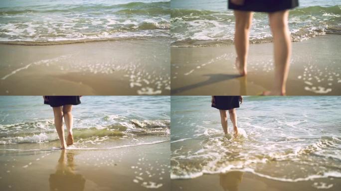女孩走在海边赤脚光脚行走沙滩海浪