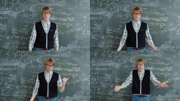 数学导师的肖像在黑板上写公式，然后看着相机说话