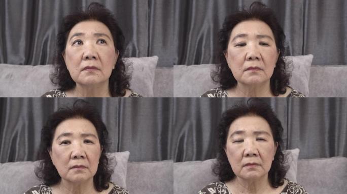亚洲高级女性在家中担心和思考的肖像
