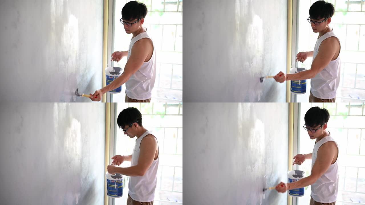 亚洲中国男人画房子客厅墙