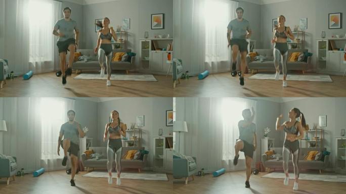 穿着运动服的强壮而美丽的运动健身夫妇正在大力慢跑，并在明亮宽敞的客厅与现代室内装饰中互相击掌。