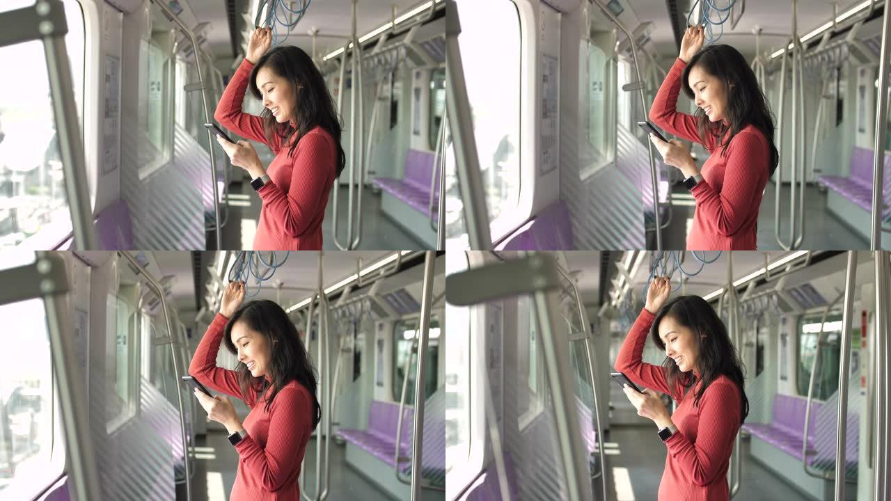 亚洲妇女在子路上使用电话进行社交媒体