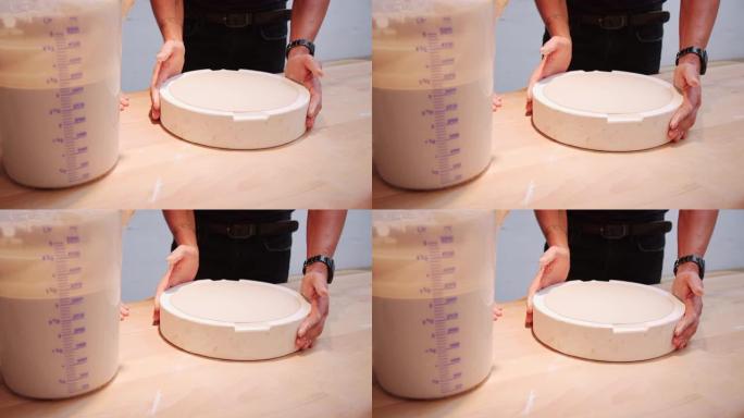 陶器艺术家在车间制作陶瓷锅