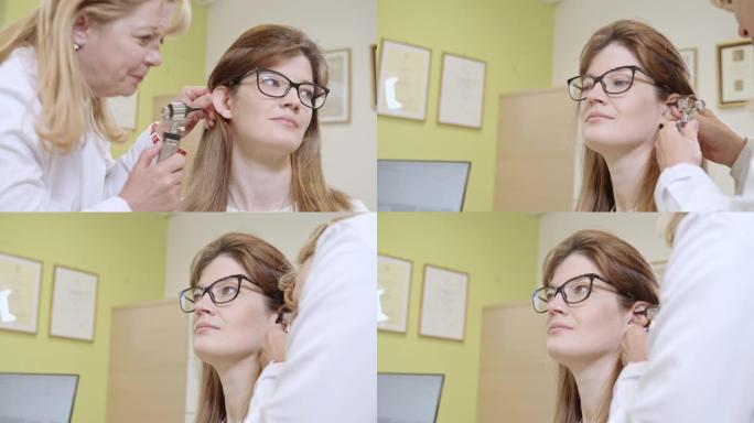 MS医生用耳镜分析女人的耳朵