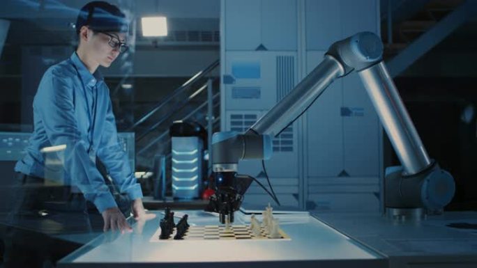 专业的日本开发工程师正在通过使用未来派机械臂下棋来测试人工智能界面。他们在一个高科技的现代研究实验室